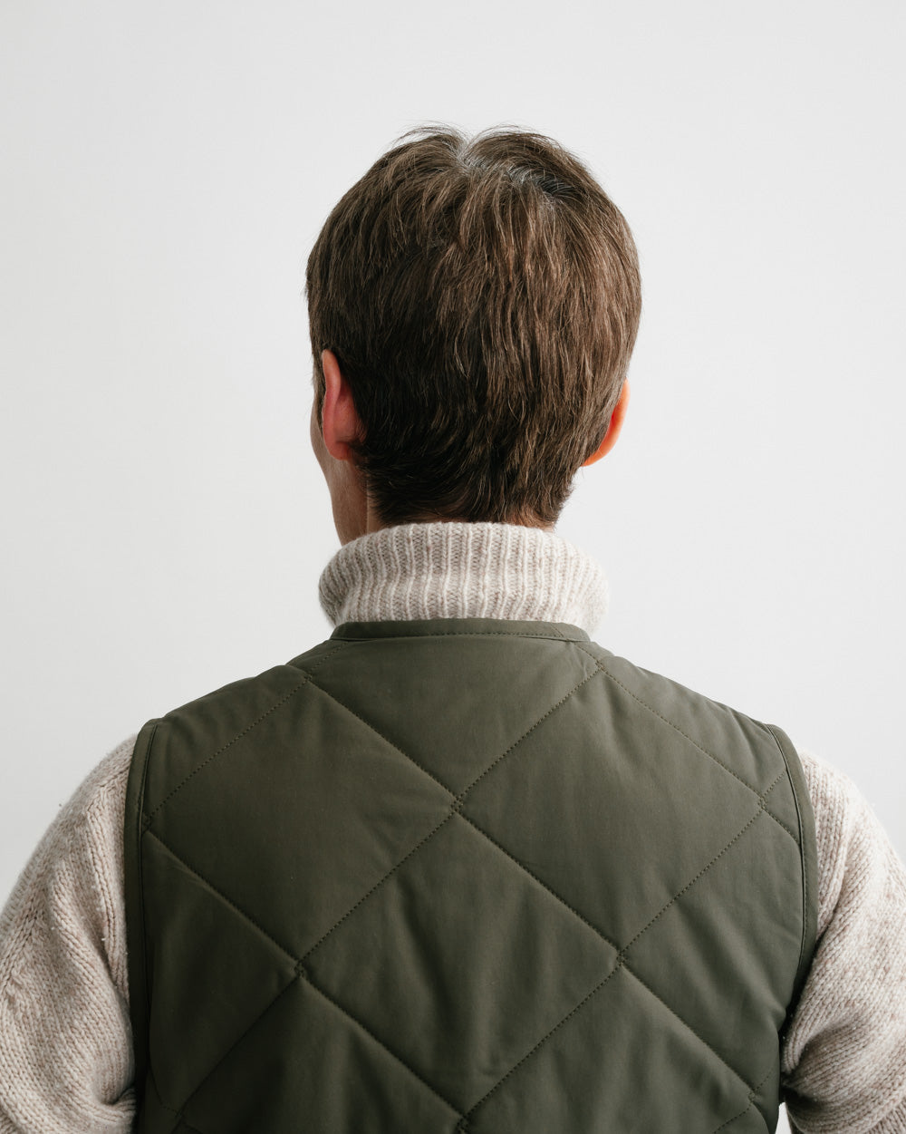 Gallery images of the WOMEN'S SPRUCE GREEN QUILTED VEST